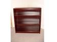 Wood free standing bookcase. For sale I have a Wooden....