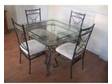 Glass and Wrought Iron table & chairs. Square,  Glass and....